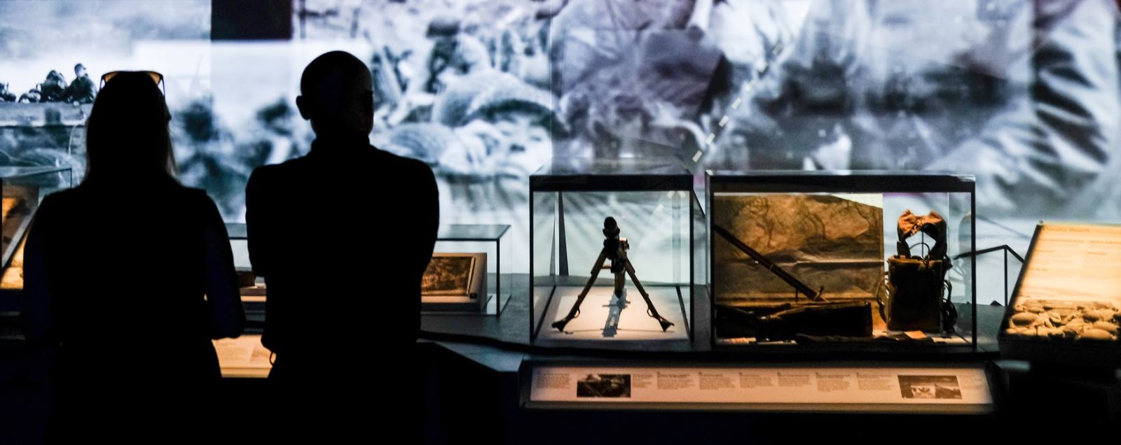 A couple viewing the displays at The D-Day Story