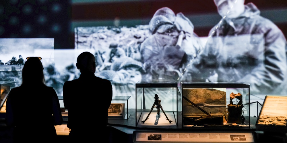 Visitors to The D-Day Story watching one of the video displays