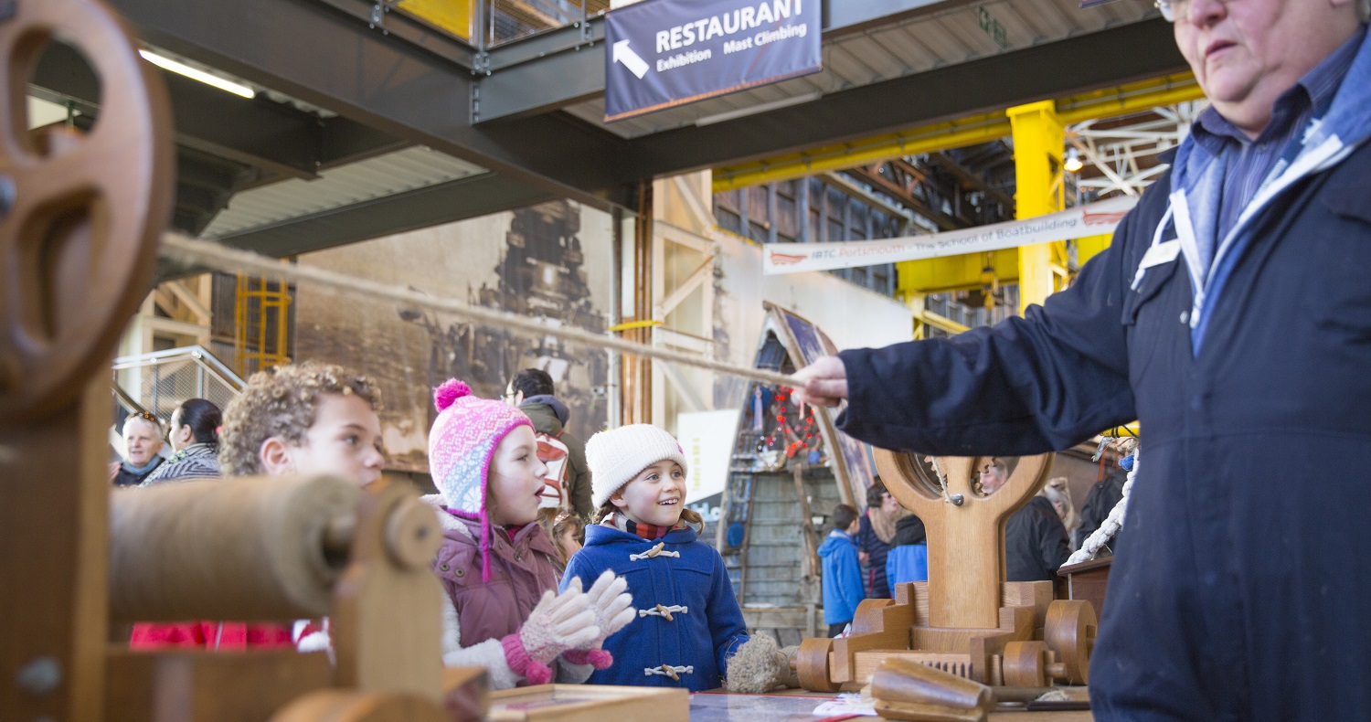 Children seeing how ropes are made at Portsmouth Historic Dockyard's Boathouse 4