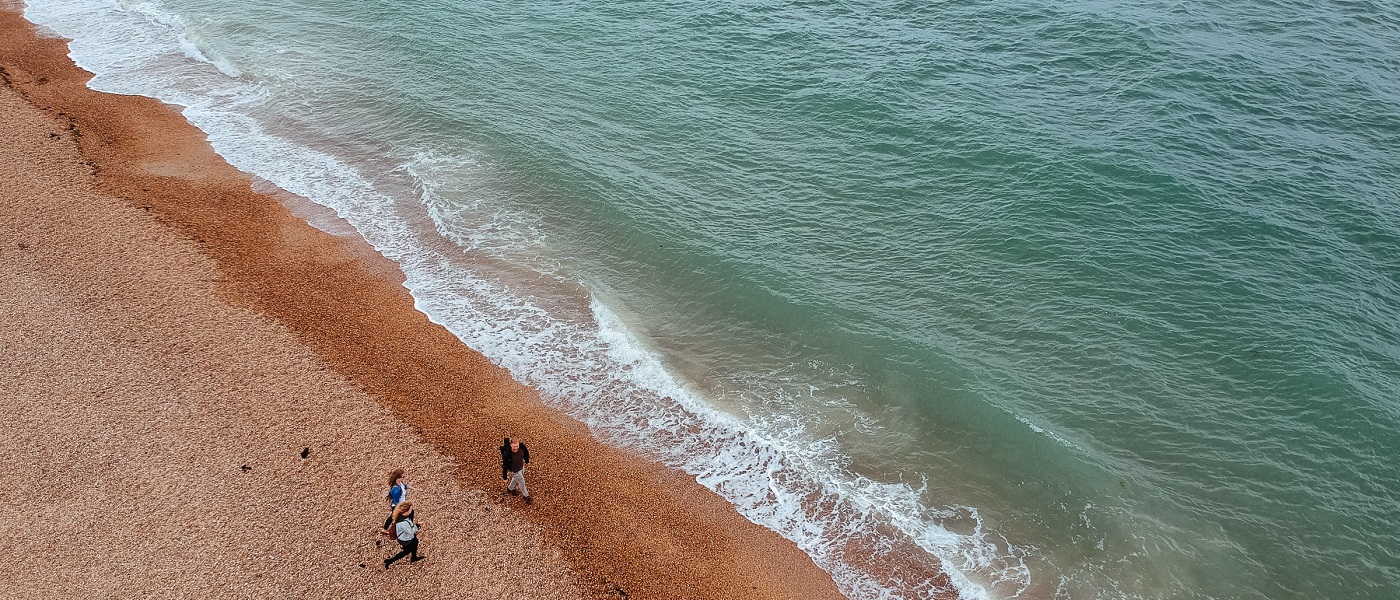 People walking along Southsea Seafront