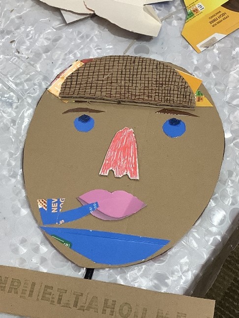 Cardboard Sherlock head with pipe