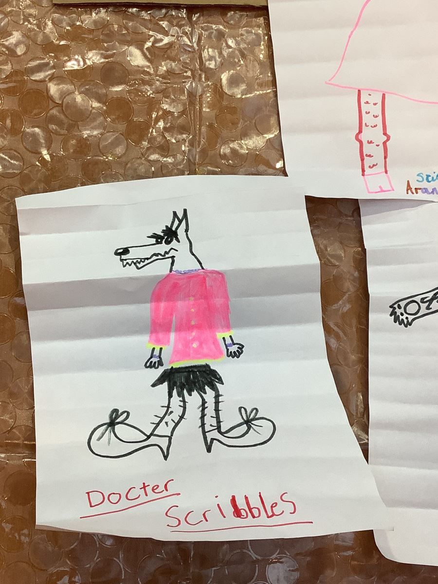 Wolf called Docter Scribbles in a pink vest, black skirt and ballerina shoes